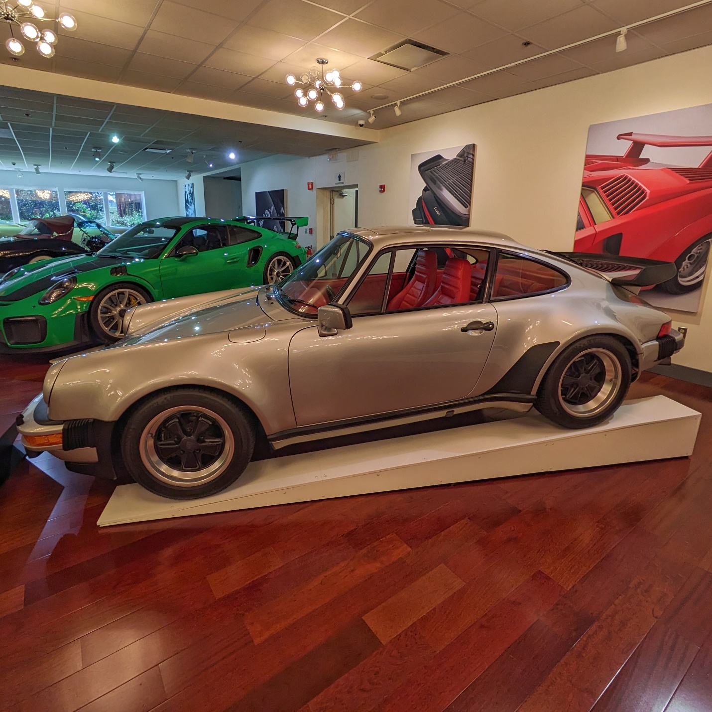 In a room full of killer Porsche 911s, the old 930 Turbo is my favorite. Mid-90s Speedsters were a close second.