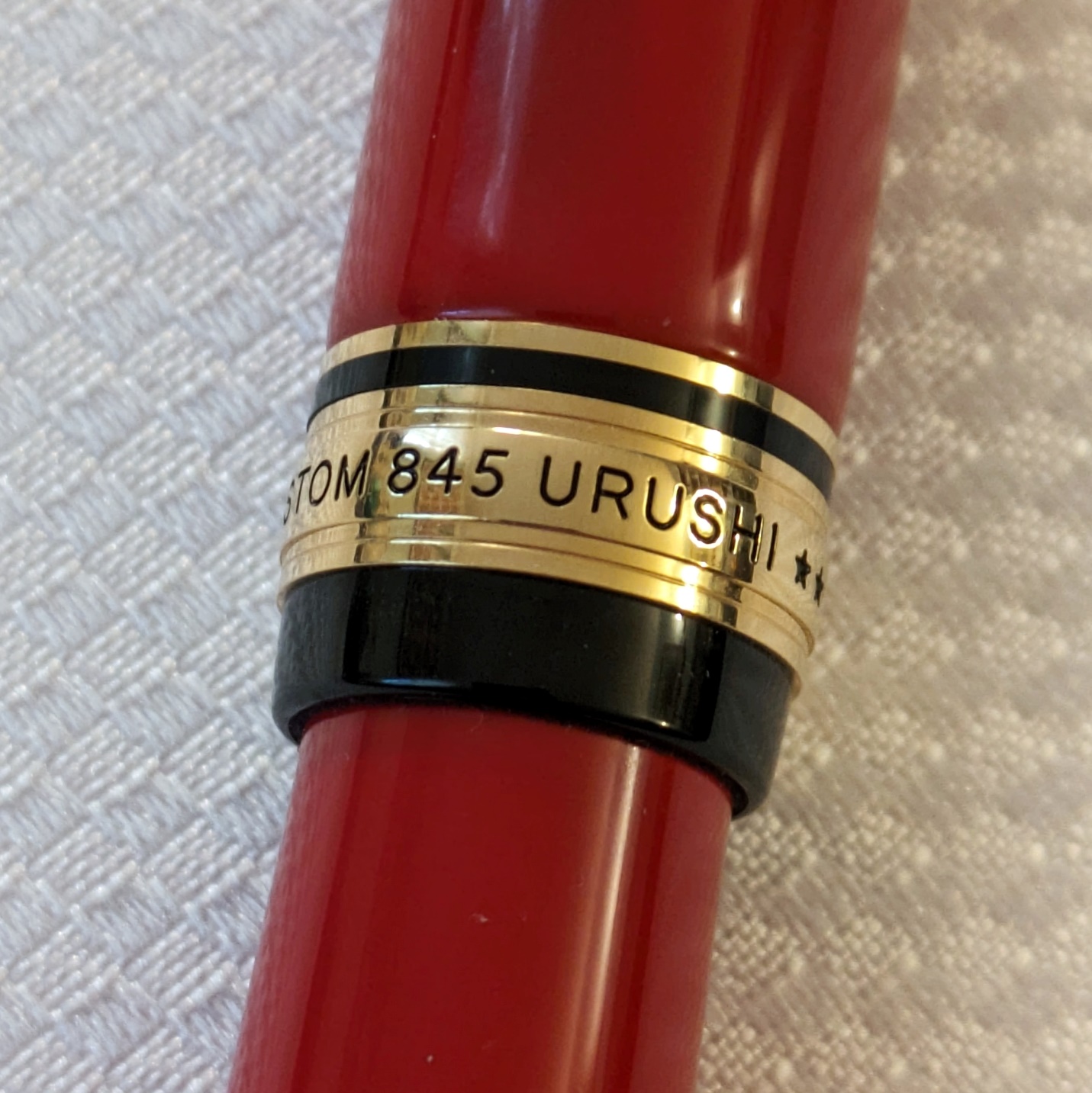 Black, gold, and deep red make an outstanding color combination on this pen.