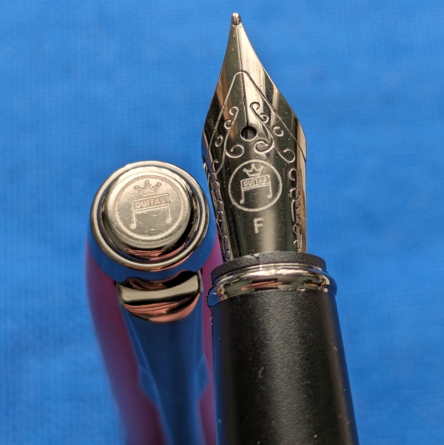 Matched branding on the cap finial and nib is a nice touch. 